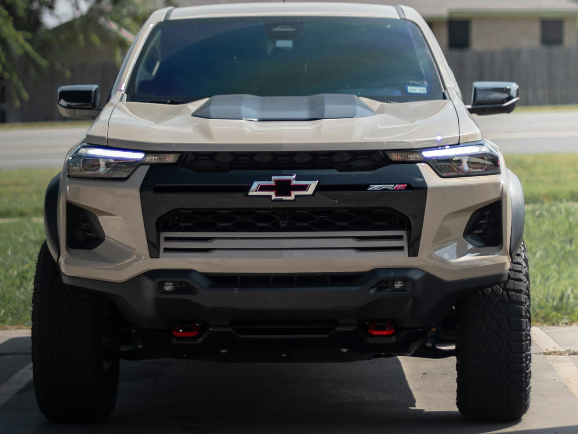 Front view of a tan third-generation Chevrolet Colorado ZR2
